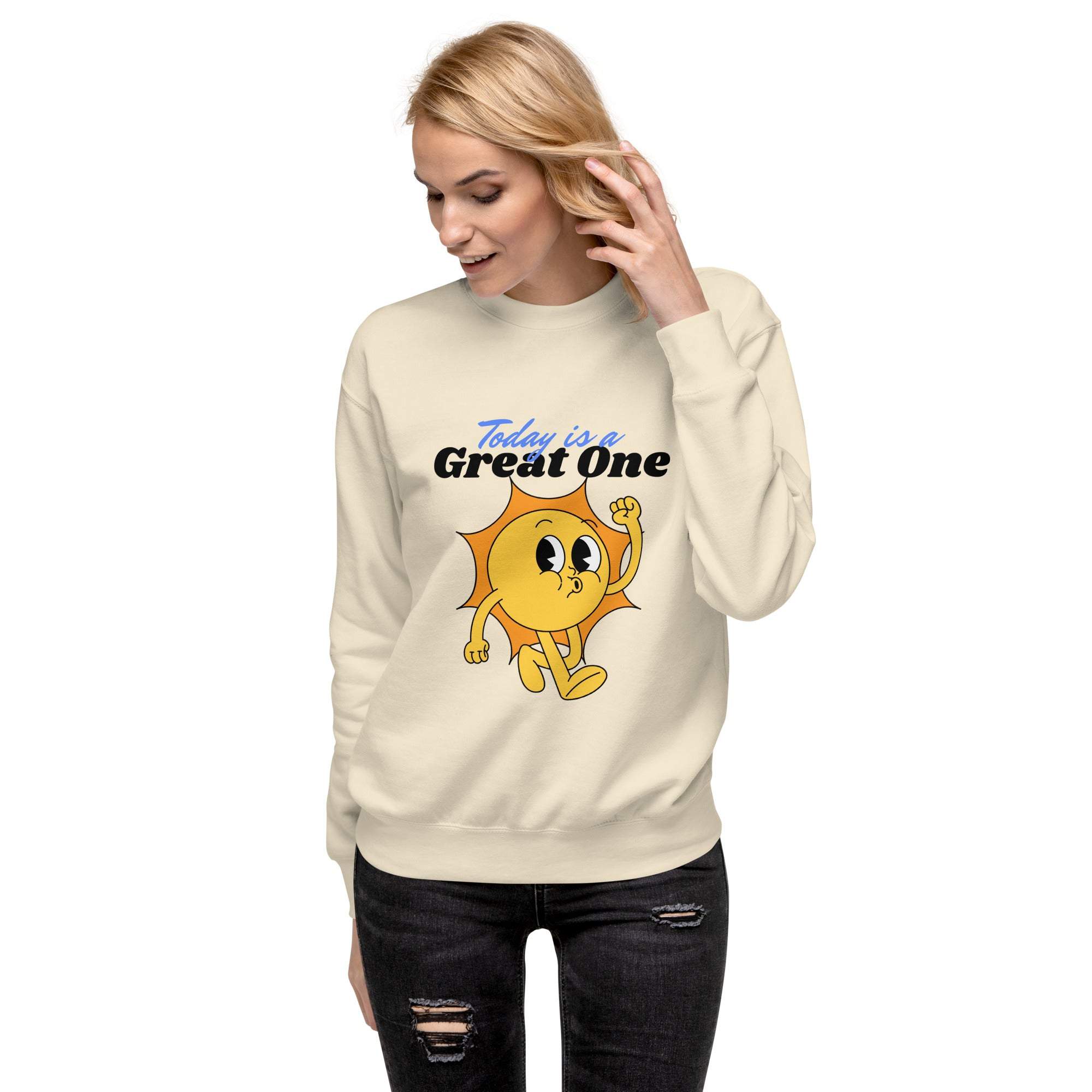 Woman wearing Positive Sun Sweatshirt with cheerful sun graphic and motivational text saying "Today is a Great One"