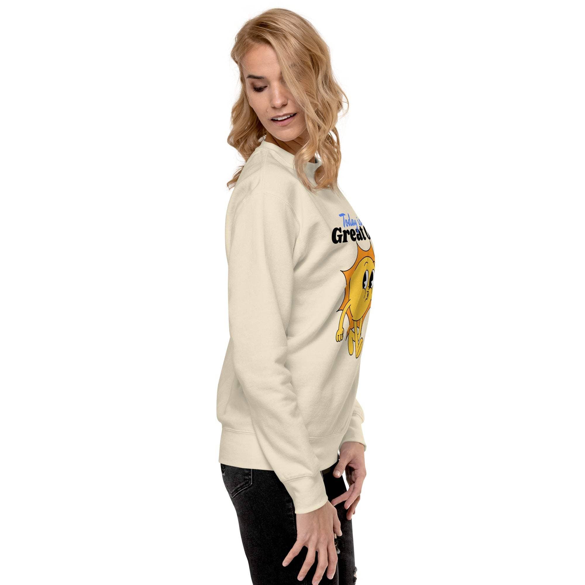 Woman wearing beige Positive Sun Sweatshirt with cheerful sun graphic and motivational text, casual fit