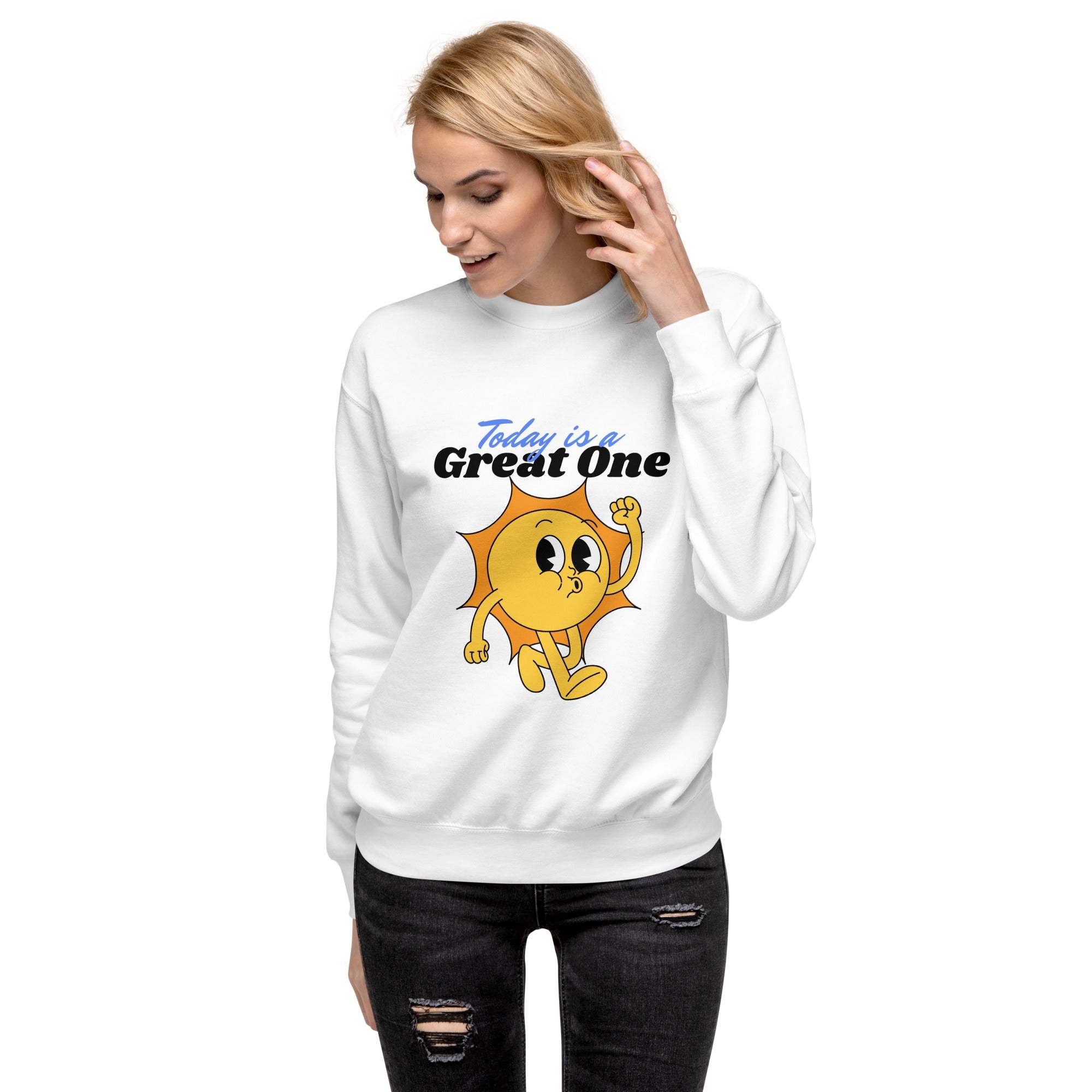 Woman wearing white Positive Sun Sweatshirt with cheerful sun graphic and motivational text "Today is a Great One"