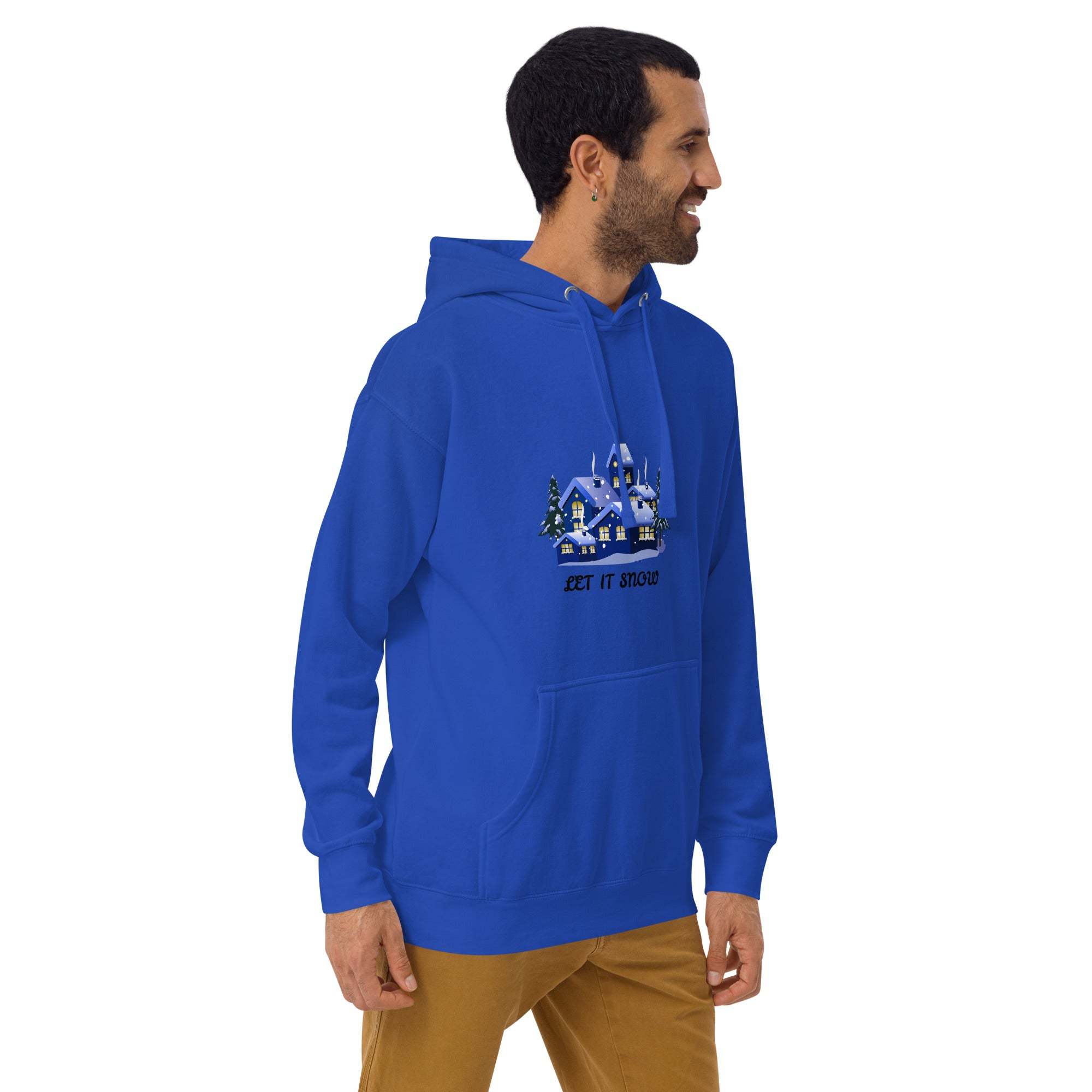 Man wearing blue Let It Snow Hoodie with snowy village design and front pocket