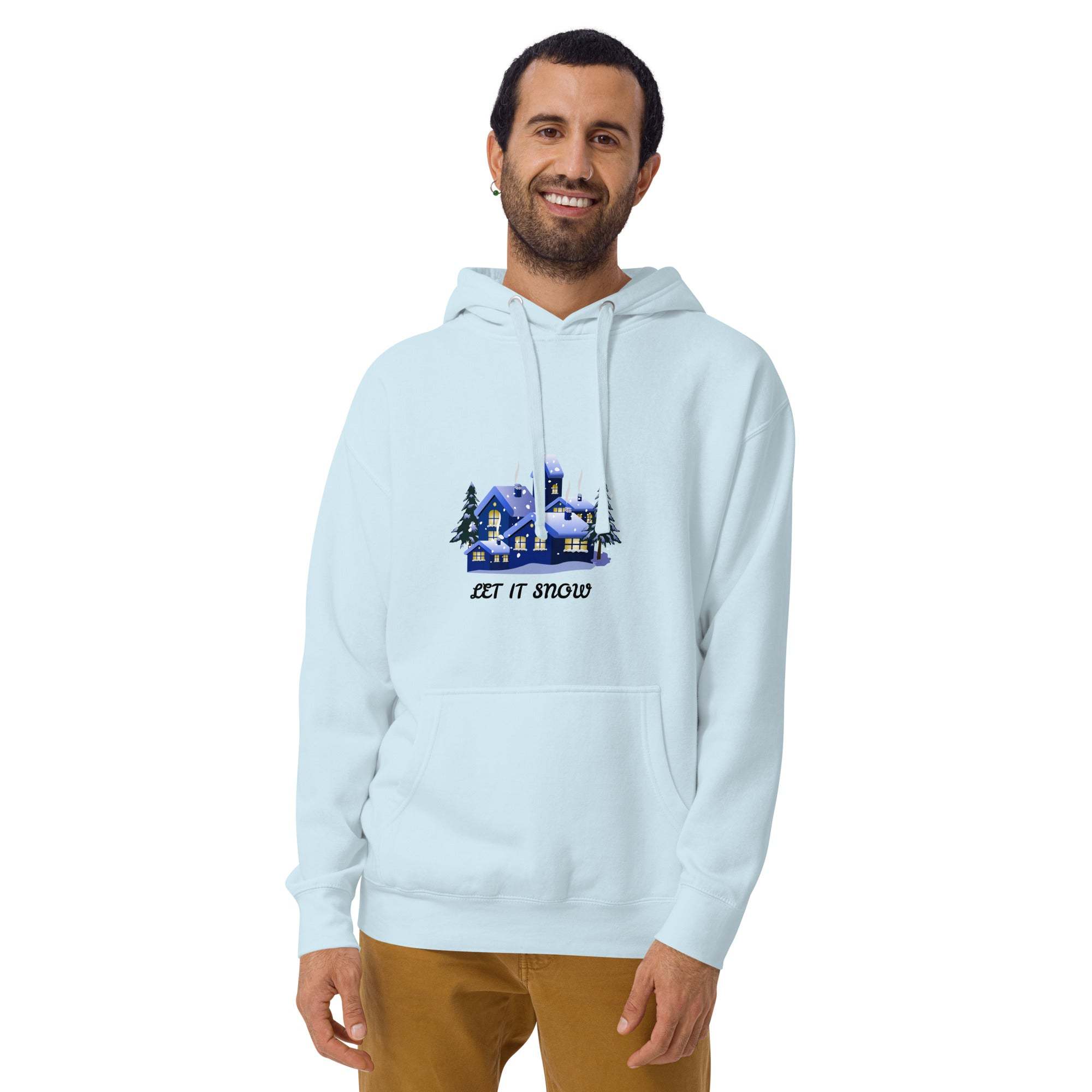 Man wearing light blue Let It Snow Hoodie with snowy village design and front pocket
