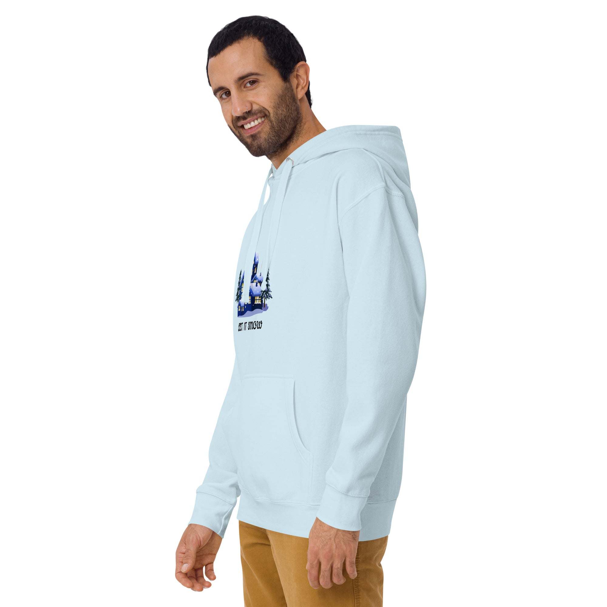 Man wearing light blue Let It Snow hoodie with snowy village design and front pocket