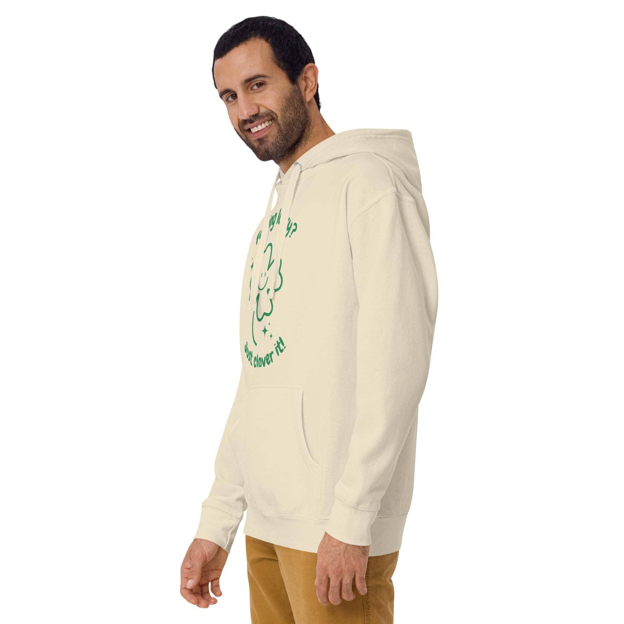 man wearing cream Lucky Clover Hoodie with green shamrock design and hood