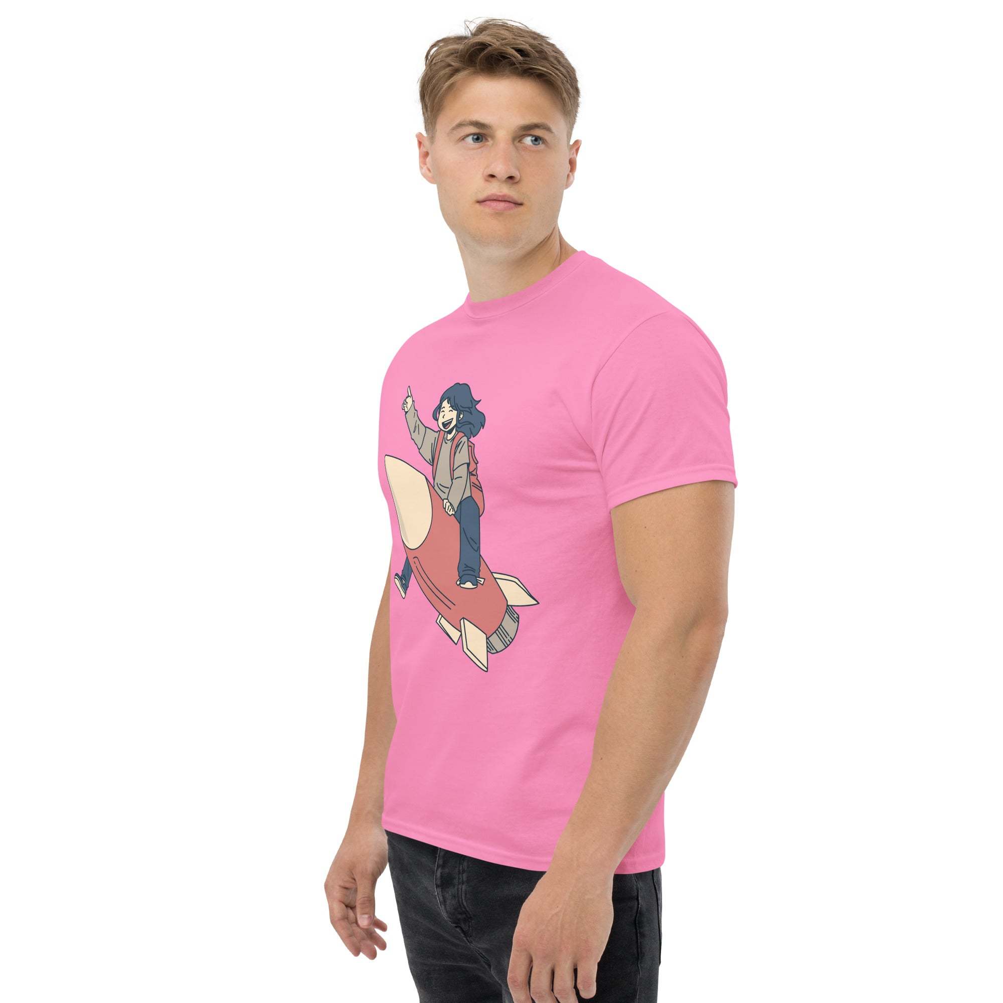 Man wearing pink Rocket Ride T-Shirt with retro cartoon rocket and character graphic, unisex fit