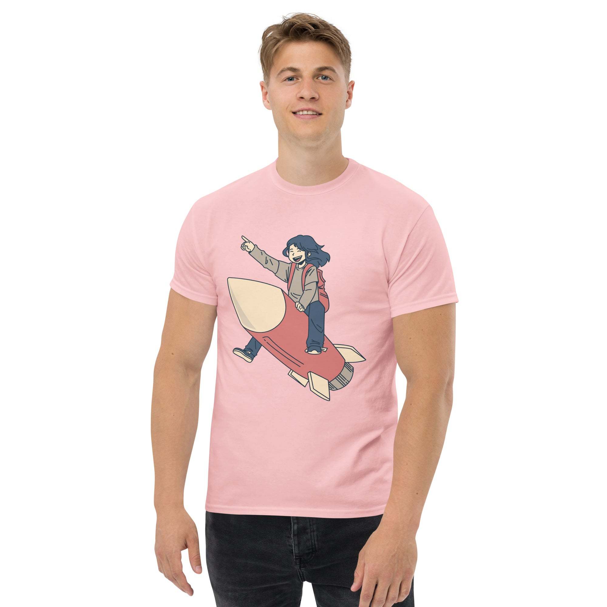 Man wearing pink Rocket Ride T-Shirt with retro cartoon rocket and astronaut design
