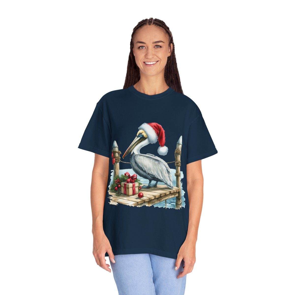 Pelican Santa T-Shirt with festive pelican wearing Santa hat and sunglasses, palm trees background