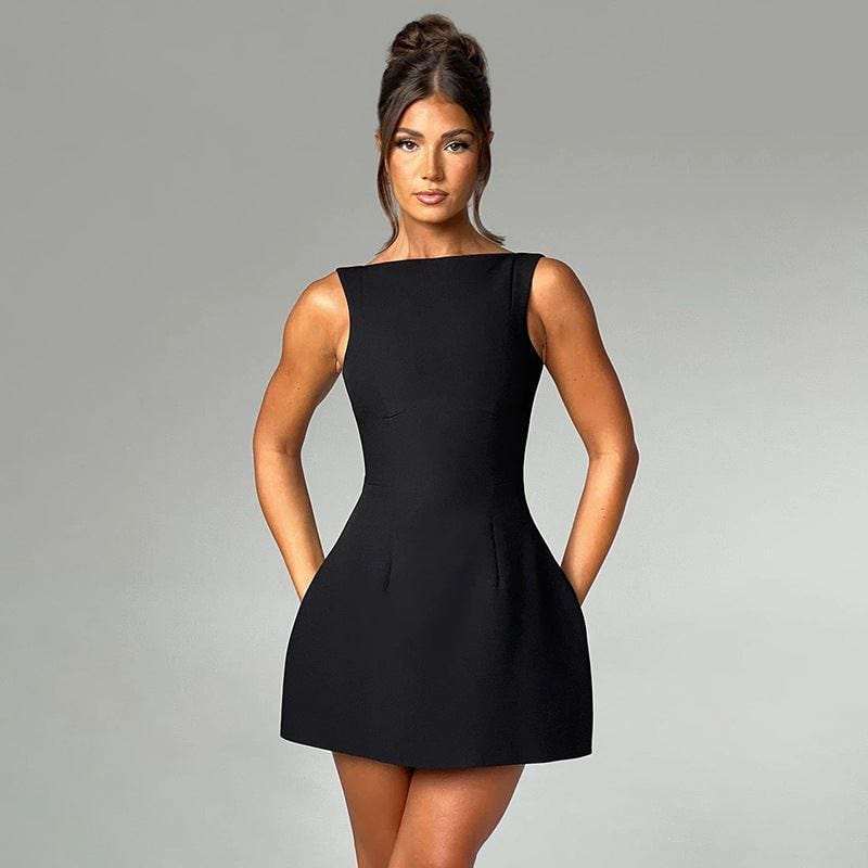 woman wearing sleeveless black mini summer dress against gray background summer dresses for women