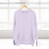 Pink fleece hoodie with adjustable hood and kangaroo pocket on wooden hanger