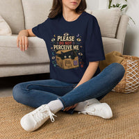 Black cat hiding in box with "Please Do Not Perceive Me" weirdcore graphic on t-shirt