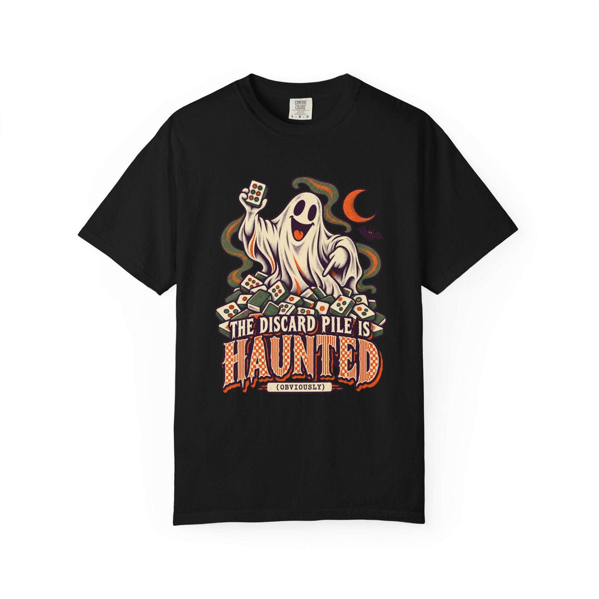 Black Comfort Colors 1717 Halloween mahjong T-shirt with a ghost holding a tile and “The Discard Pile Is Haunted (Obviously)” lettering.