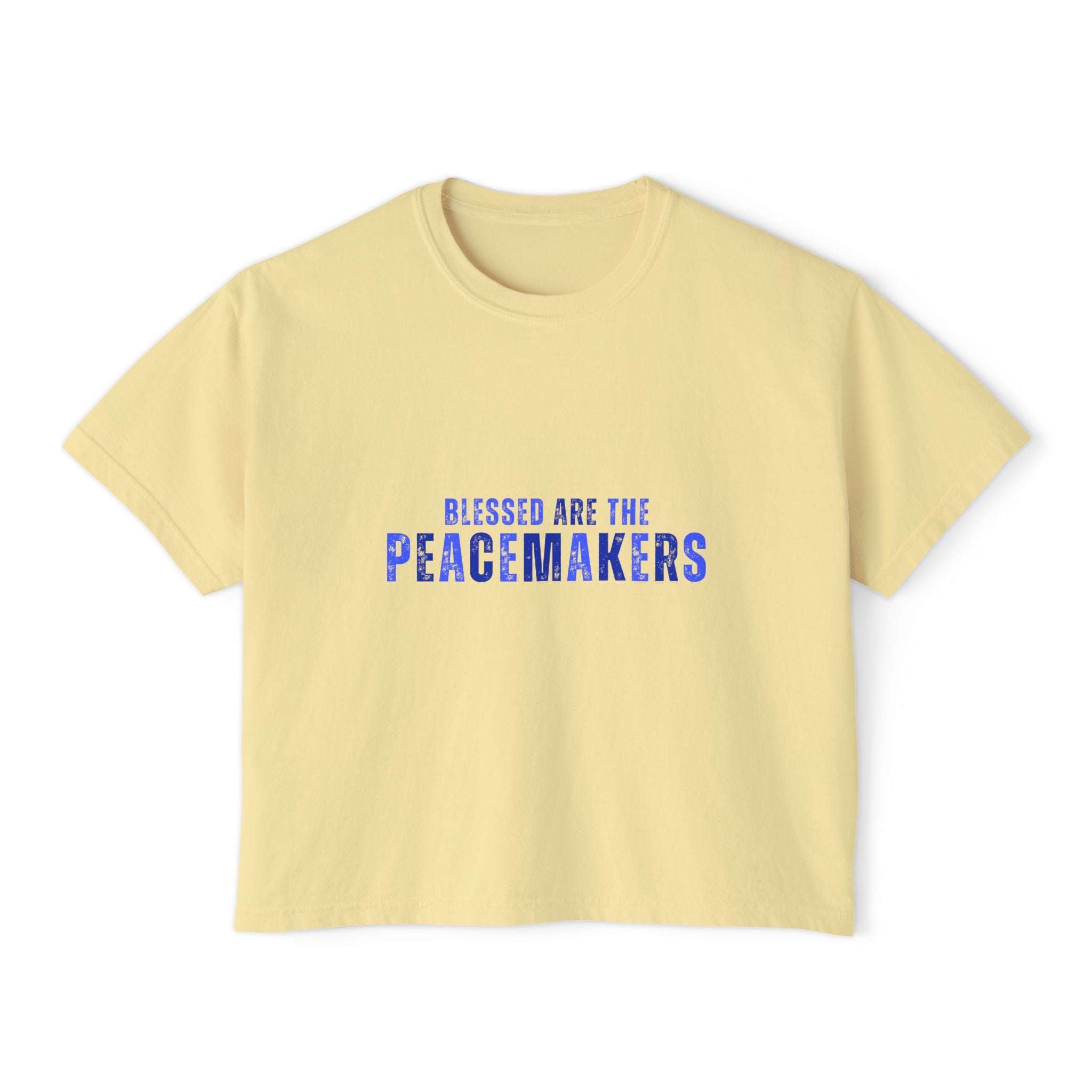 Women's boxy yellow tee with "Blessed are the Peacemakers" blue text, 100% cotton, vintage look