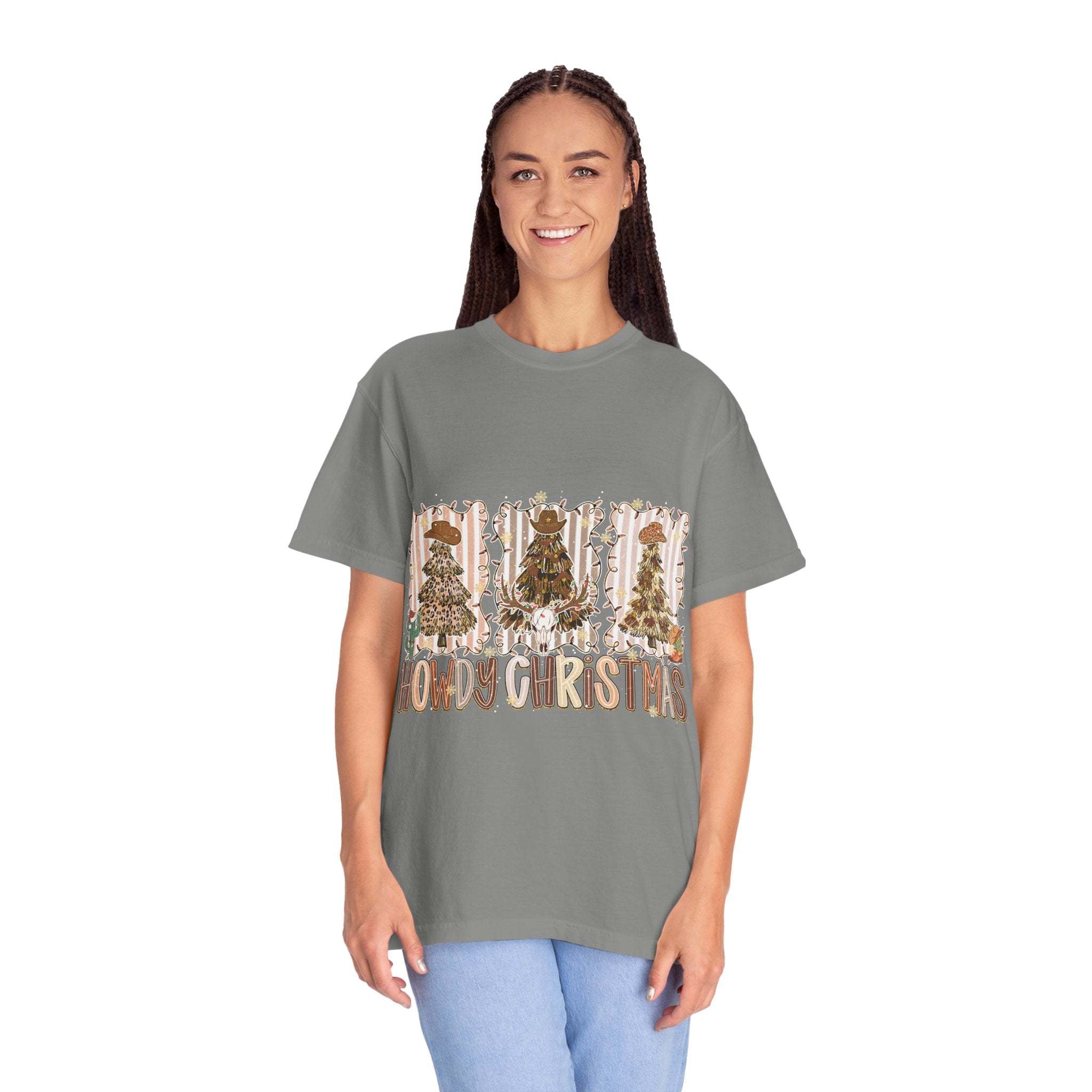Woman wearing gray Cowboy Howdy Christmas t-shirt with festive tree design and casual fit