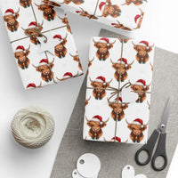 Christmas gift wrapping papers with Santa Highland Cows design on white background
