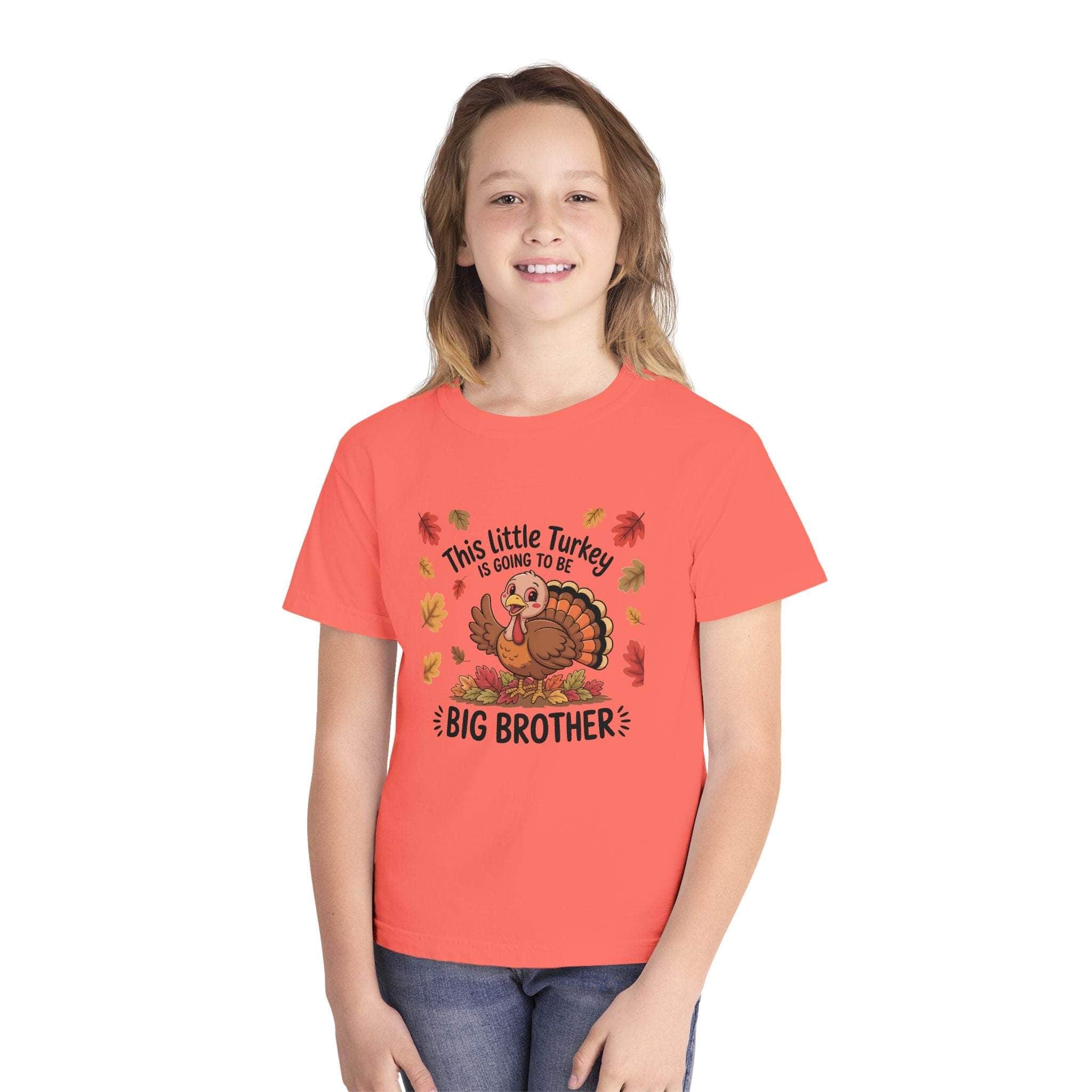 Youth Tee Big Brother Thanksgiving announcement shirt with turkey graphic and fall leaves design worn by child