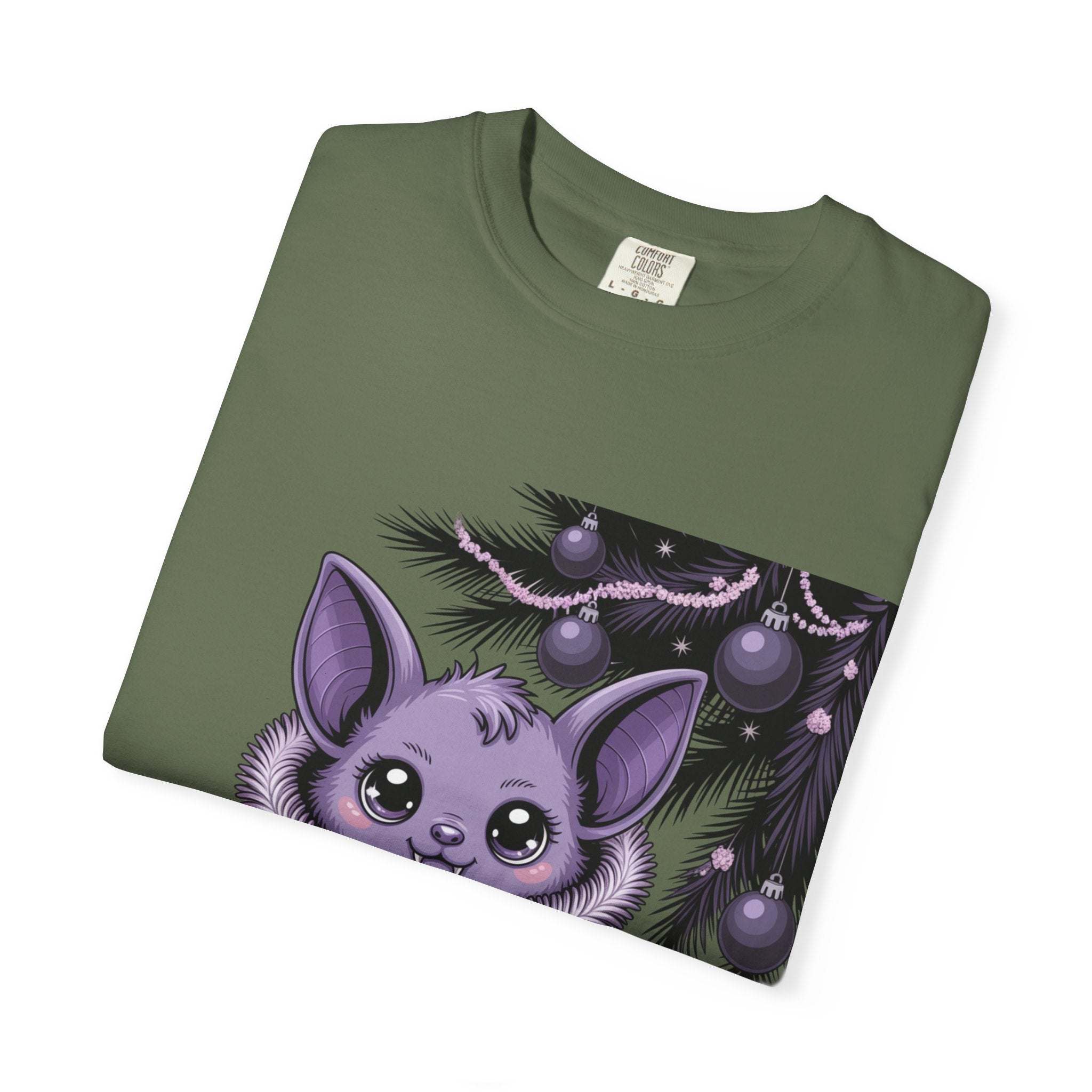 Gothmas Bat T-Shirt with purple bat and festive holiday decorations on garment-dyed green cotton tee