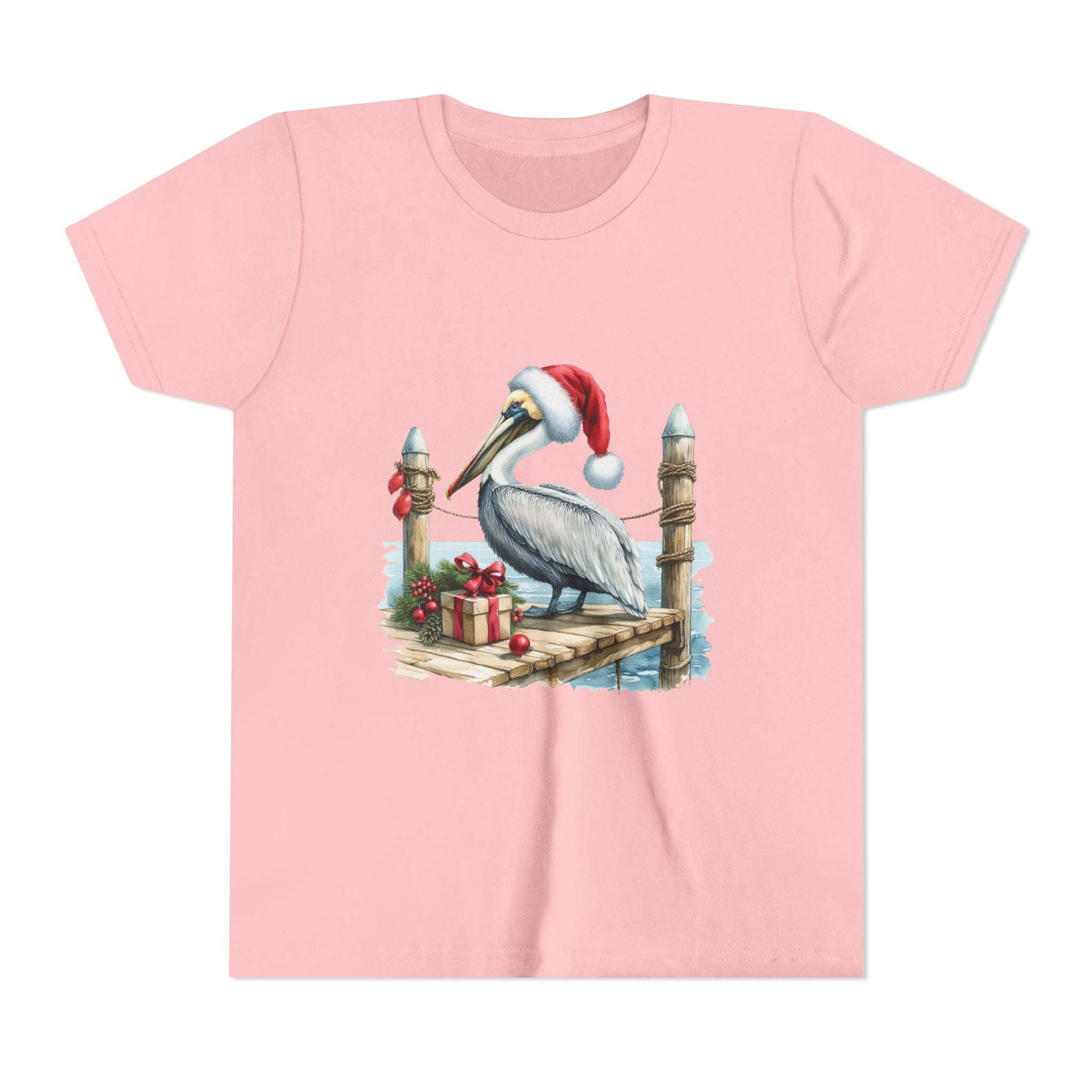 Pink t-shirt with a Christmas pelican design on a white background