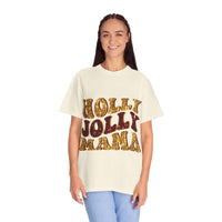 Woman wearing a white Faux Glitter Holly Jolly Mama t-shirt with gold glitter text and blue jeans