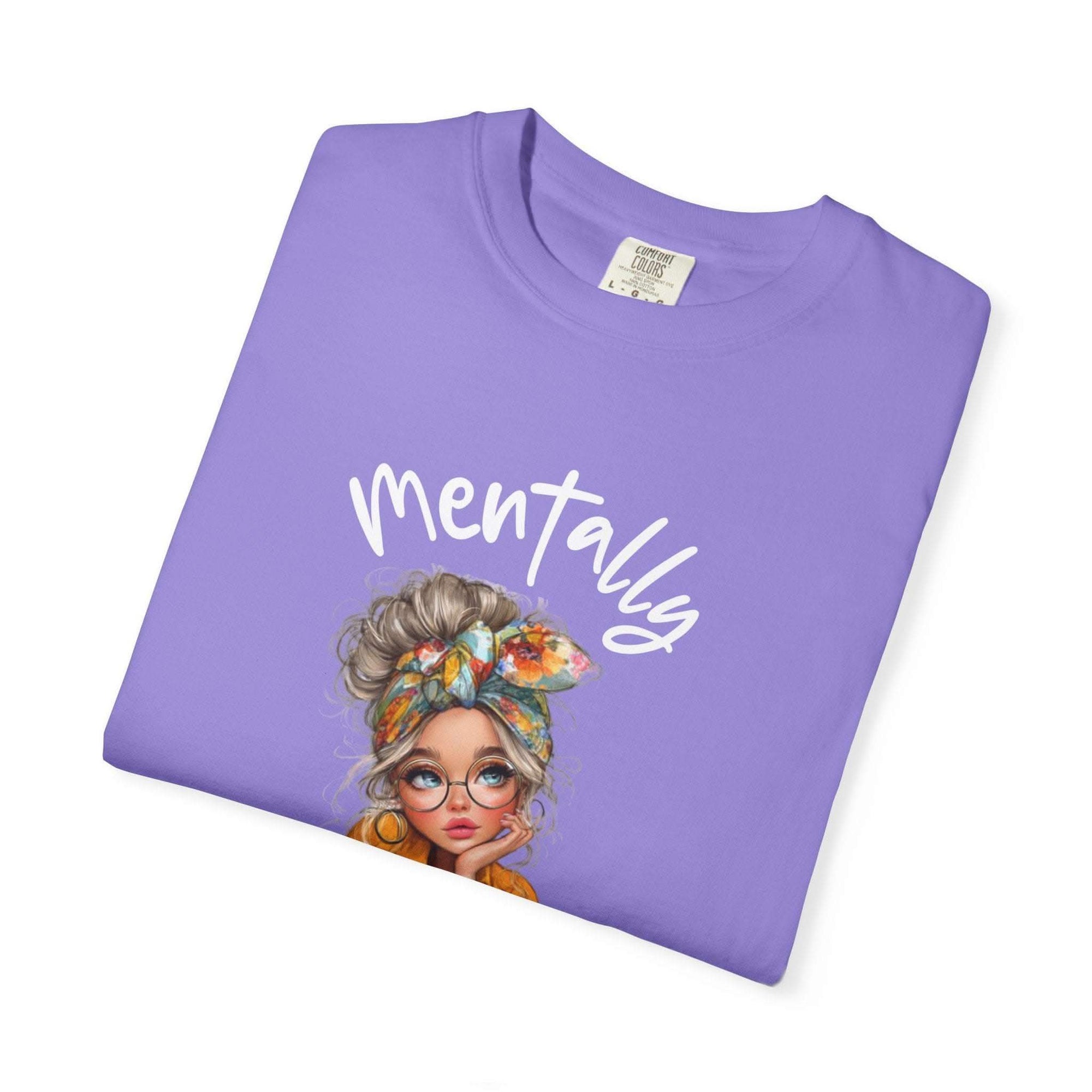 Purple Mentally in My Cozy Era T-shirt with hand-lettered text and illustrated woman with glasses and colorful headscarf