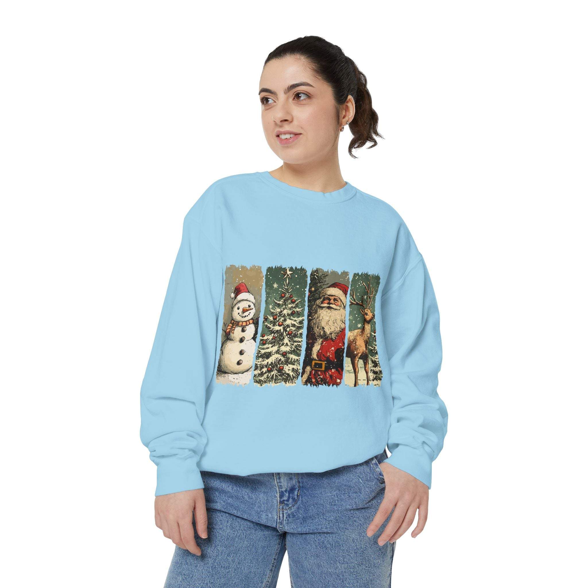 Woman wearing vintage Christmas sweatshirt with watercolor holiday characters on light blue background