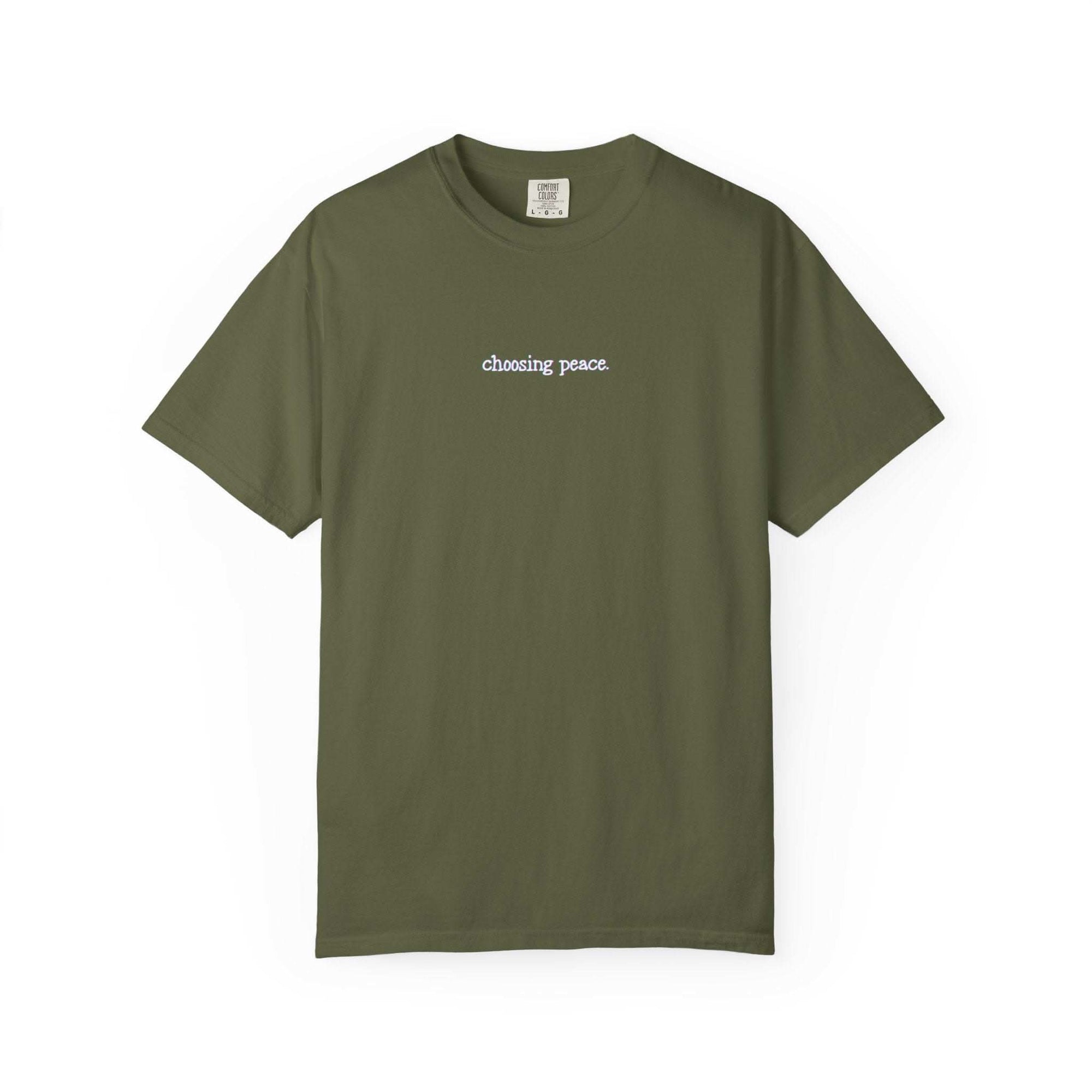 Green t-shirt with 'choosing peace' text on a white background