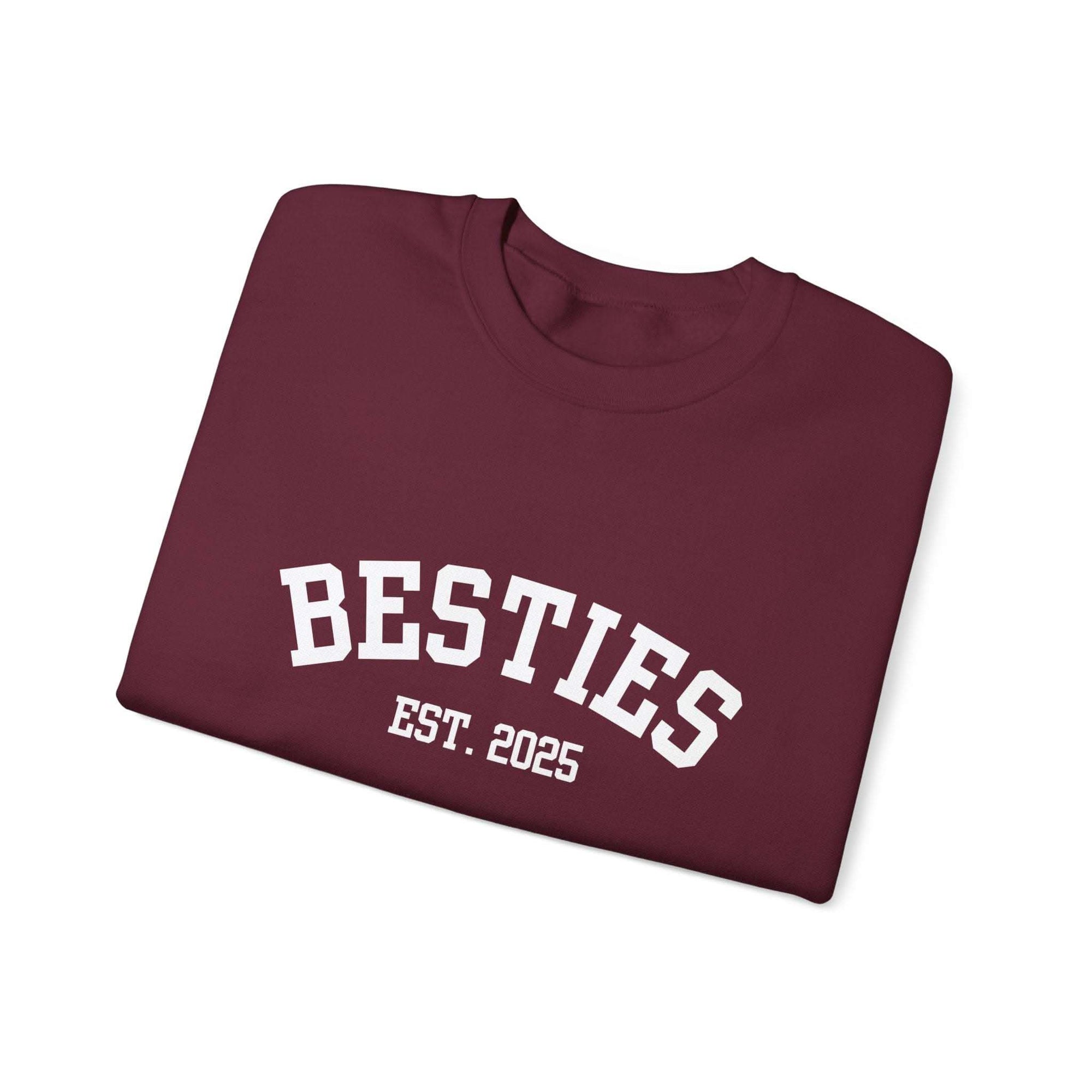 Maroon Varsity Besties Crewneck Sweatshirt with "BESTIES EST. 2025" white varsity lettering in cotton blend fabric