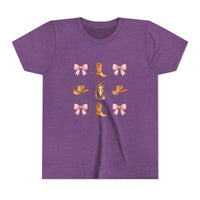 Youth pink tee with cowboy horse, boots, and bow pattern shirt