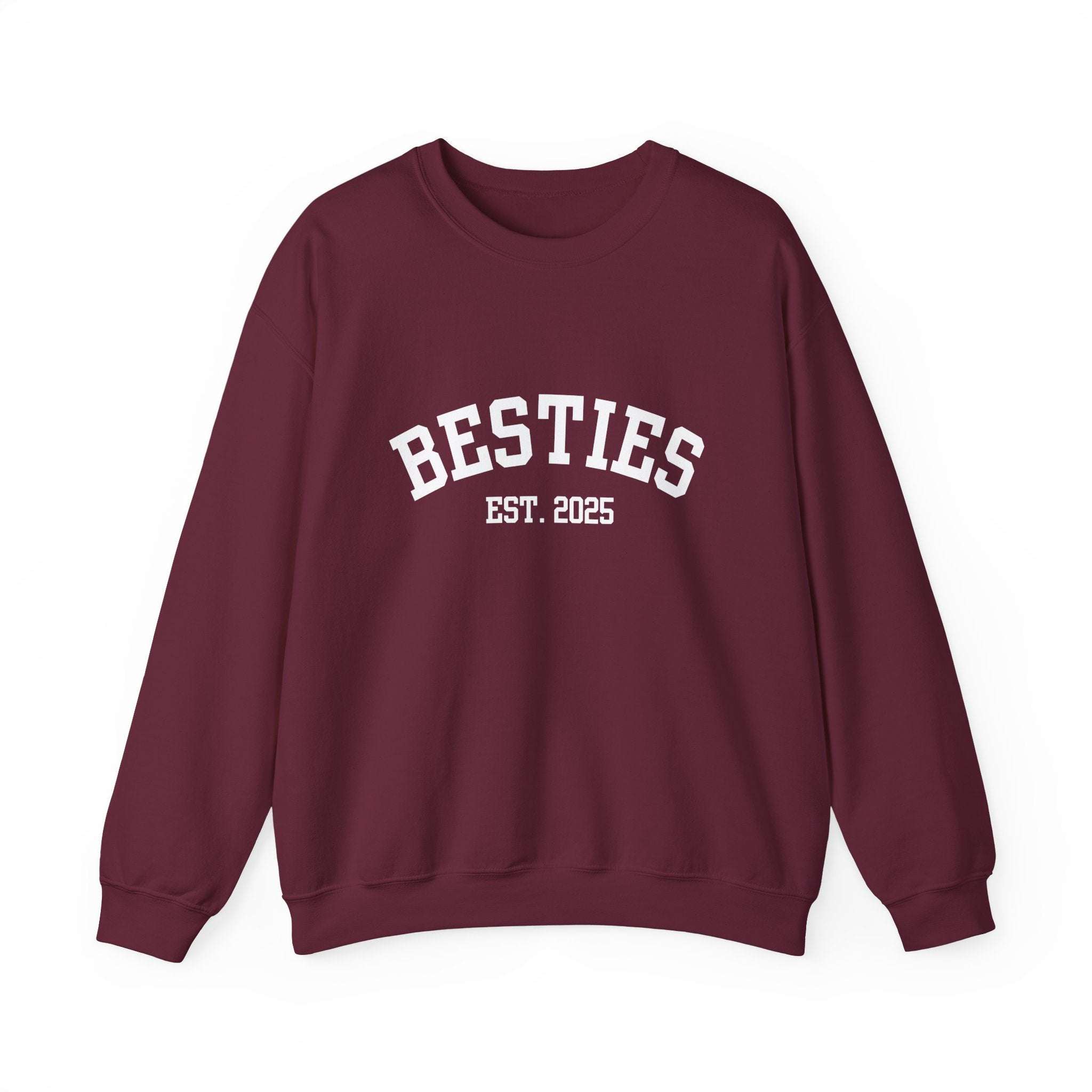 Maroon sweatshirt with 'BESTIES EST. 2025' text on a white background