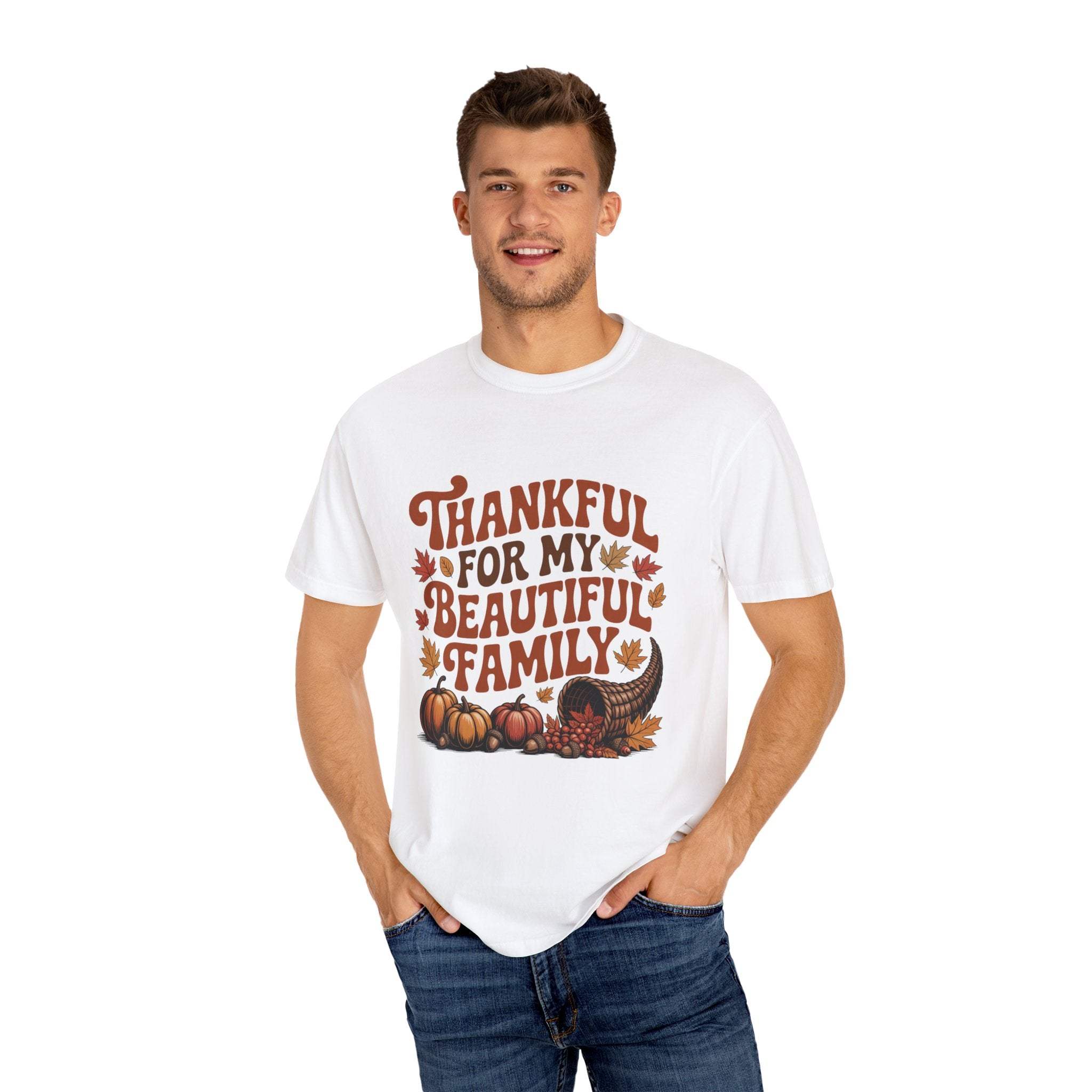 Unisex white garment-dyed T-shirt with "Thankful for My Beautiful Family" text and autumn-themed design featuring pumpkins and leaves