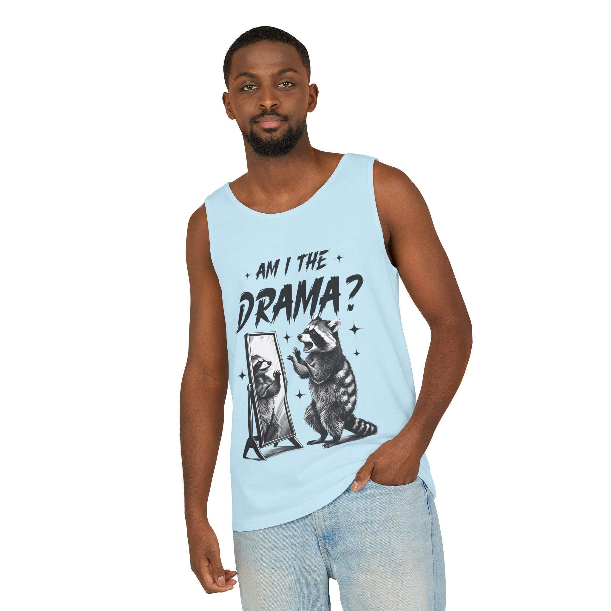 Man wearing light blue tank top with "Am I The Drama?" raccoon design, casual summer fashion tank top