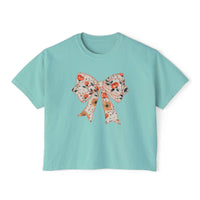 Floral coquette bow design womens tee in butter color, boxy fit, made from vintage cotton by Printify.