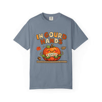A slate blue crewneck t-shirt featuring a Halloween graphic with the text 'IN CLOUD HANDS' and a smiling orange pumpkin wearing a 'WHEN' sign, displayed on a clean white background.