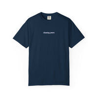 Navy blue t-shirt with 'choosing peace' text on a white background