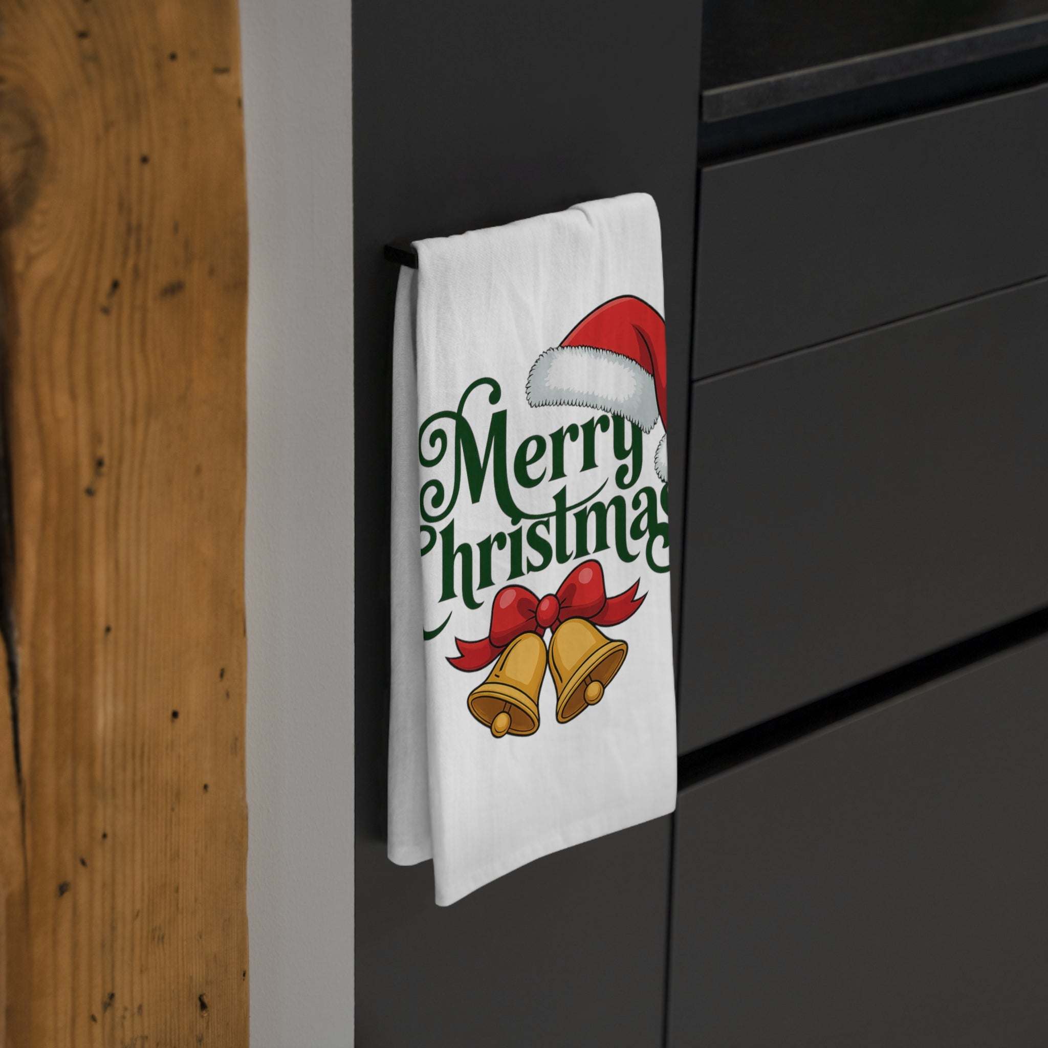 Christmas tea towel with merry bells design for festive kitchen decor