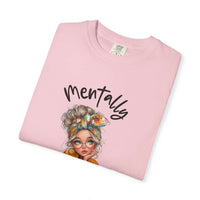 Pink Mentally in My Cozy Era T-shirt with hand-lettered text and illustrated woman with glasses and a floral headband
