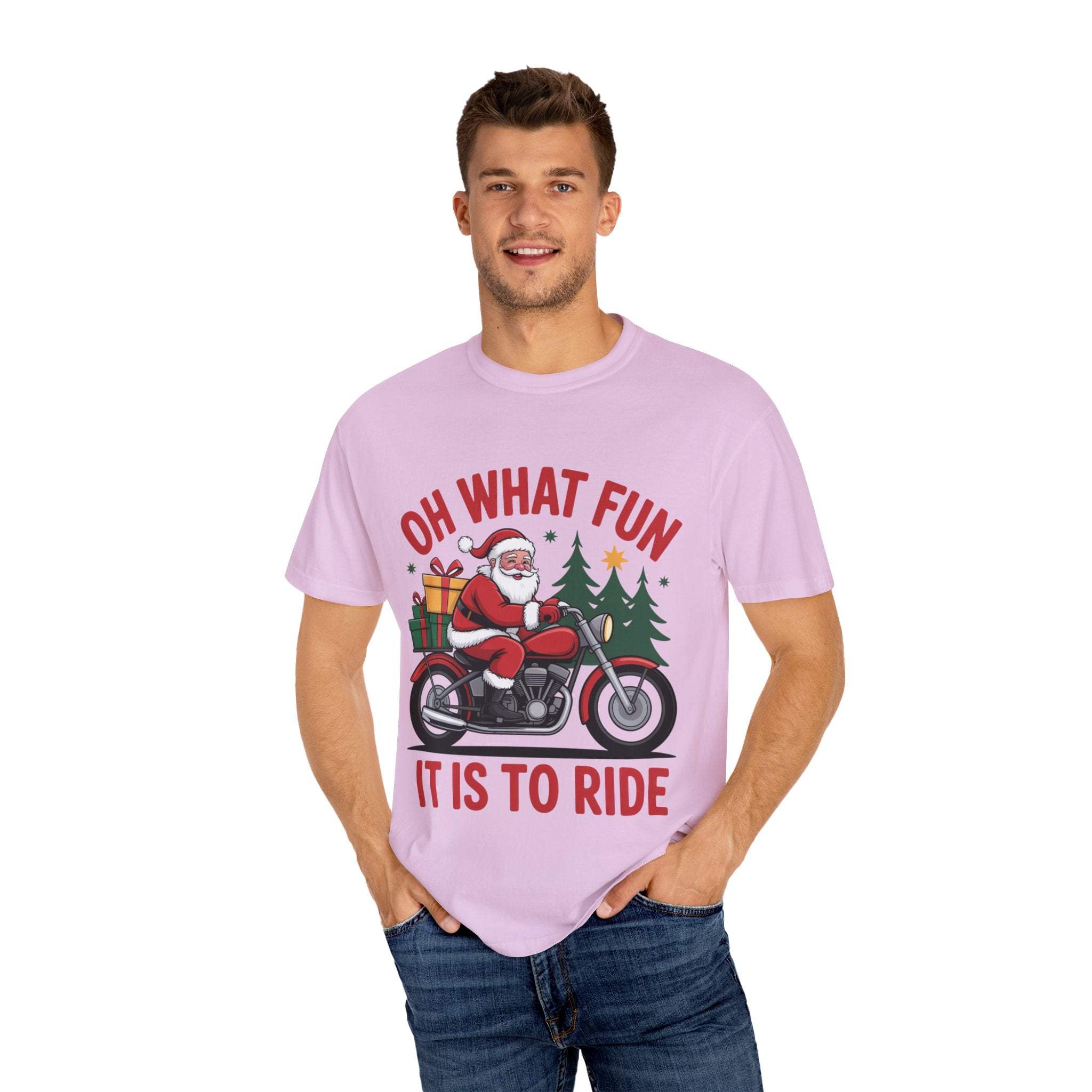 Man wearing pink Santa on a Motorcycle Christmas t-shirt with festive design