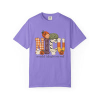 Violet NICU nurse Halloween T-shirt with patchwork lettering, a sleeping baby in a pumpkin hat, ghosts, and jack-o’-lanterns.