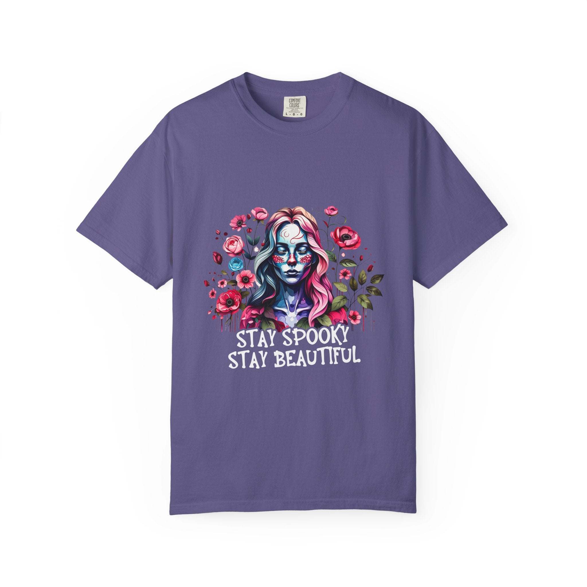 Purple floral skeleton t-shirt with "Stay Spooky Stay Beautiful" text and relaxed fit design