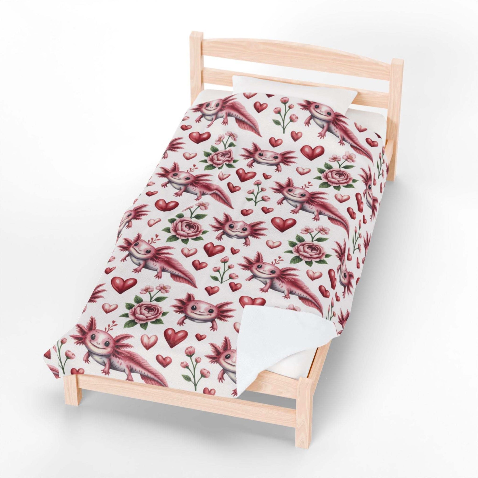 Soft velvety floral axolotl blanket with blossoms and hearts design