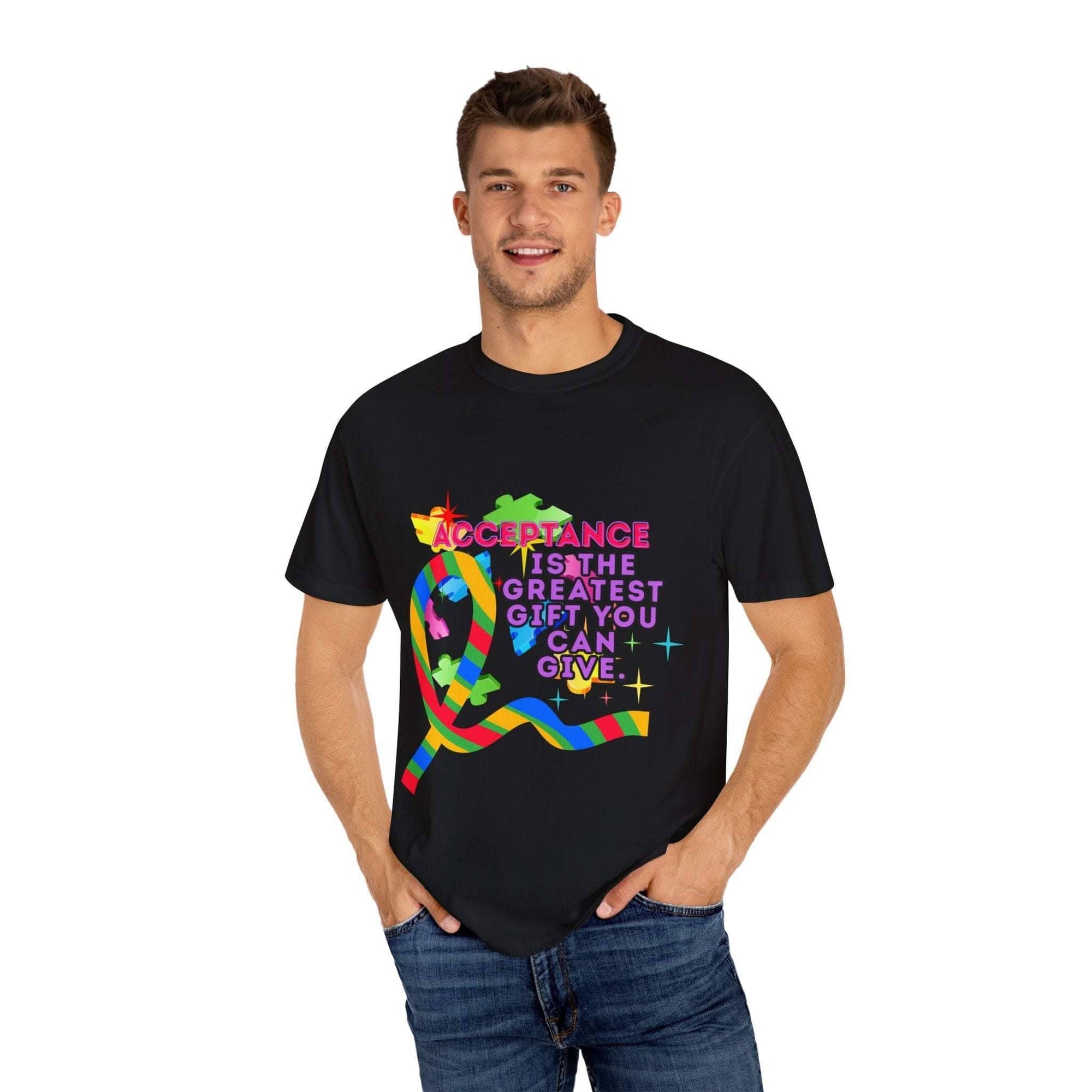 Man wearing black garment-dyed T-shirt with colorful Autism Acceptance graphic and text on front