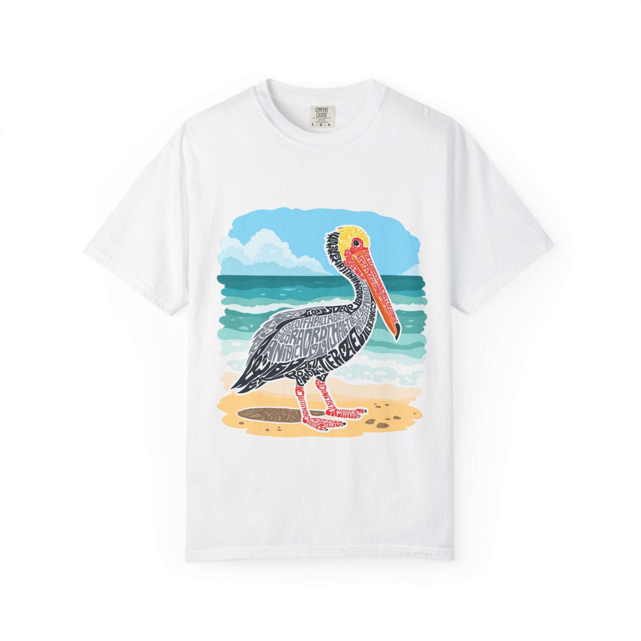 White t-shirt with vintage coastal pelican letter poster graphic design on beach background