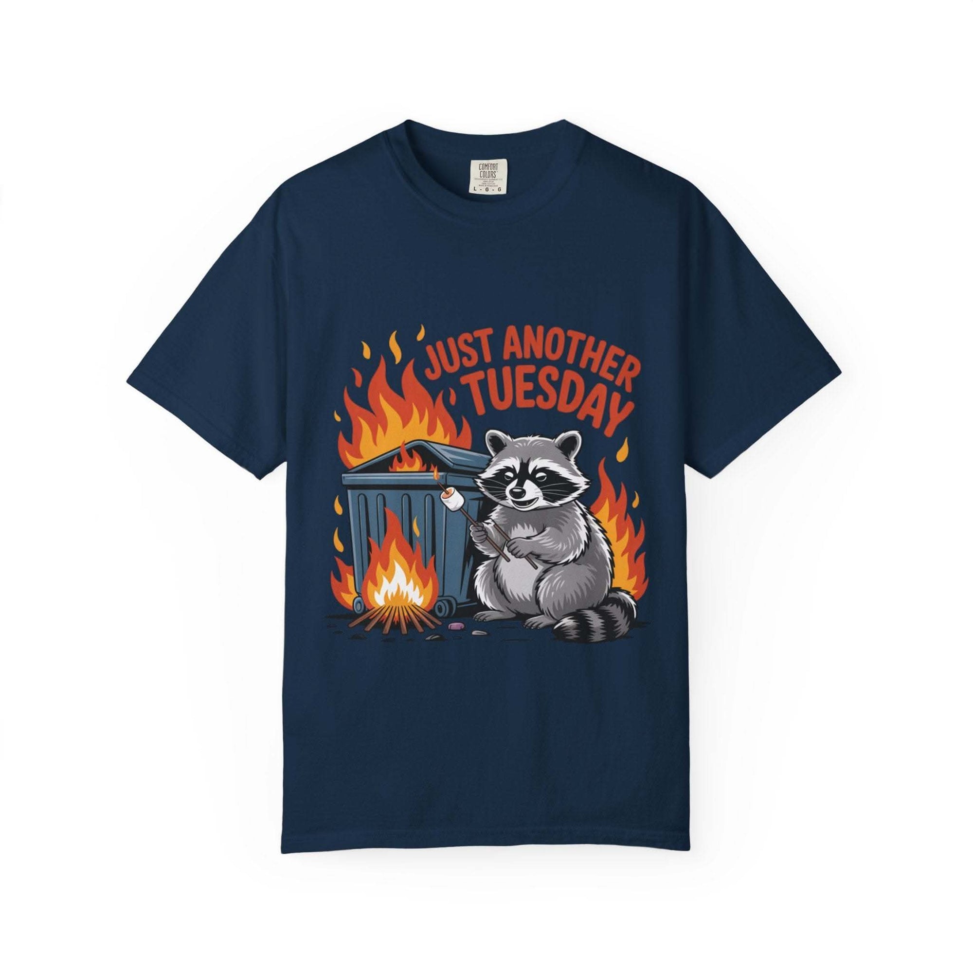 Navy blue t-shirt with a raccoon graphic and 'Just Another Tuesday' text on a white background