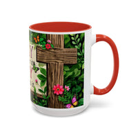 Mug with a cross and floral design on a white background