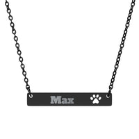 Black necklace with a bar pendant engraved with 'Max' and a paw print on a white background