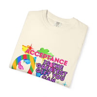 Folded garment-dyed T-shirt with Autism Acceptance design and colorful puzzle pieces promoting inclusivity and support
