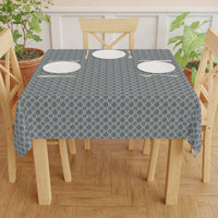 Tablecloth Indigo Floral with indigo ogee vine pattern on dining table with plates