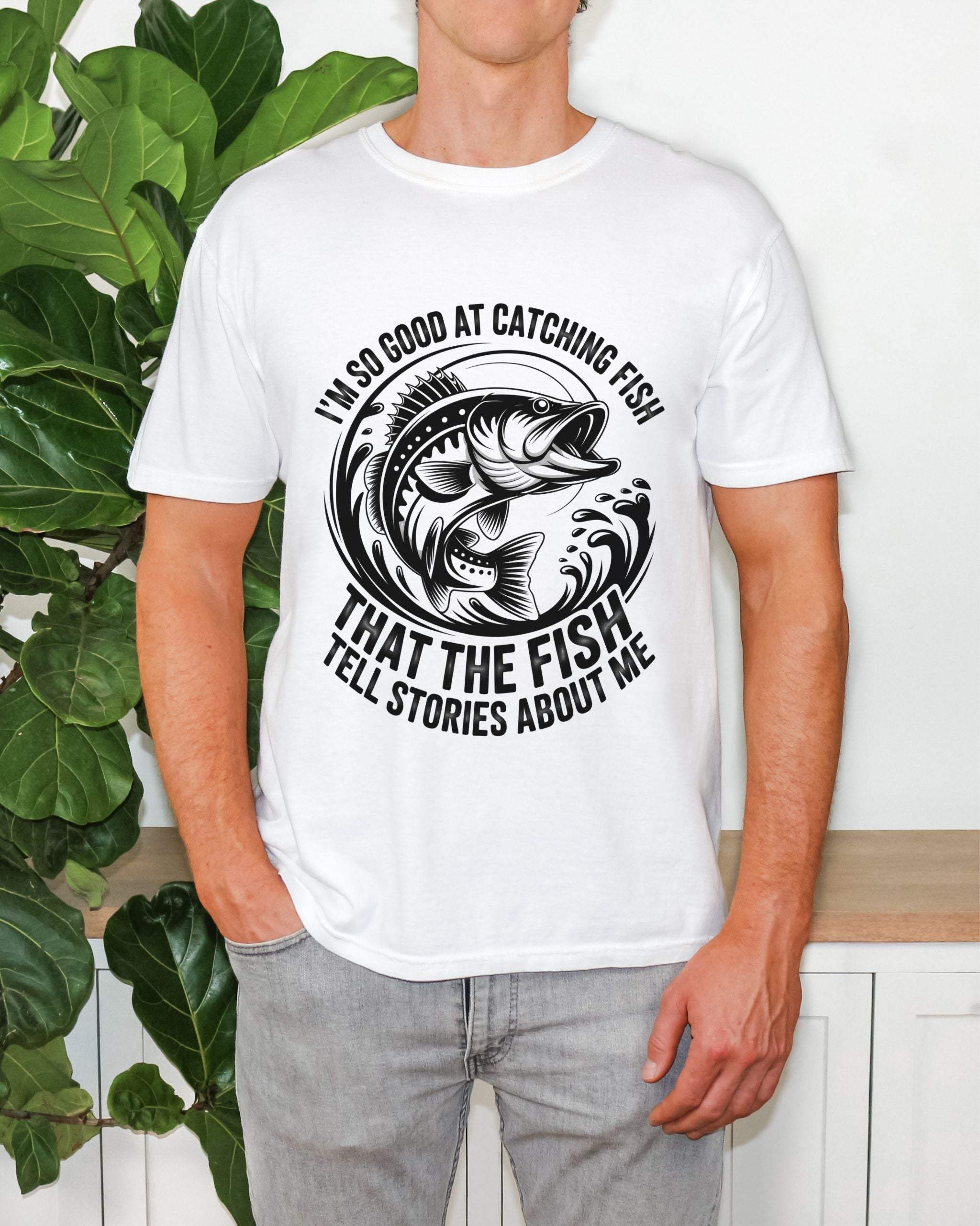 Fishing T-Shirt with humorous "So Good At Catching Fish That The Fish Tell Stories About Me" slogan on soft cotton fabric