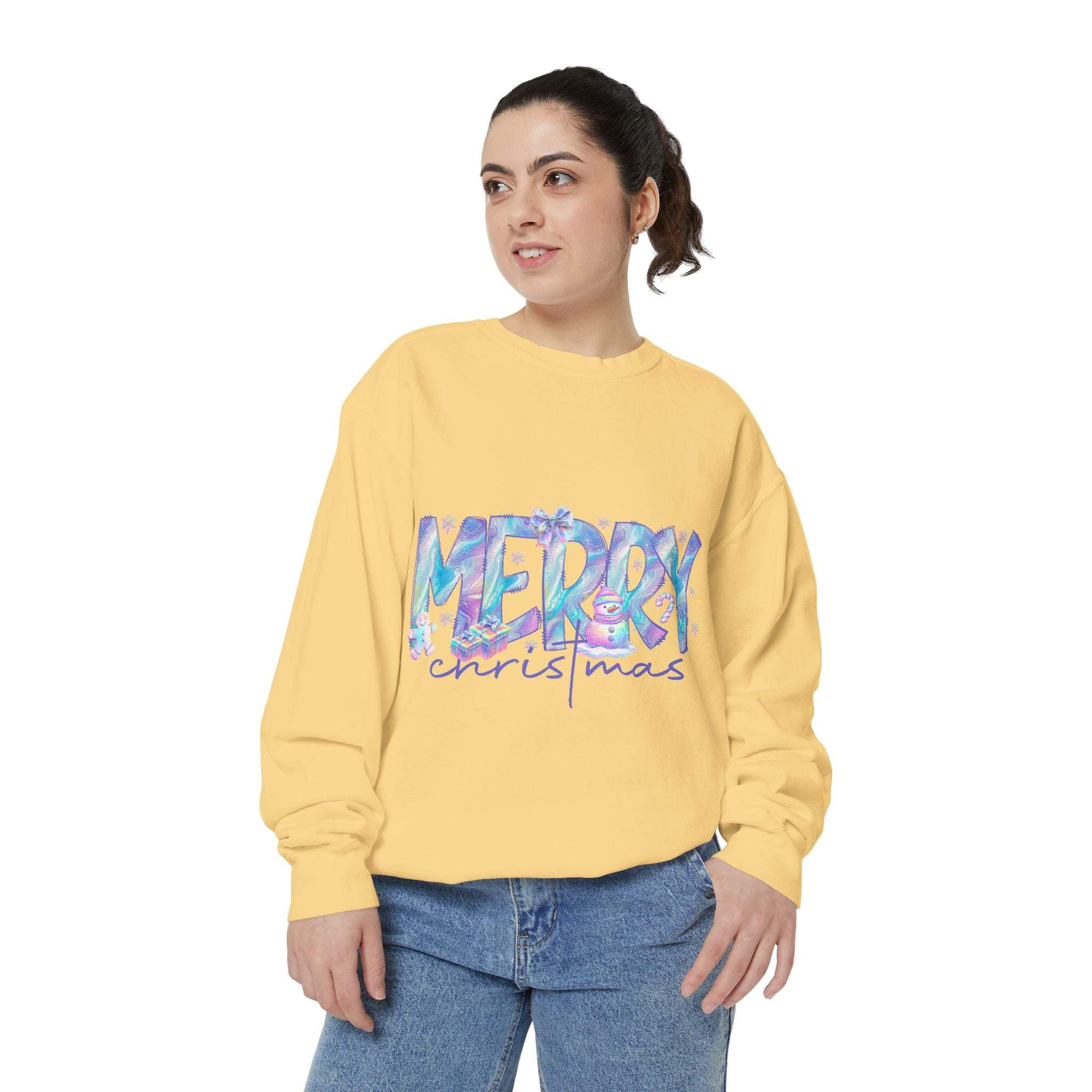 woman wearing iridescent Merry Christmas yellow sweatshirt with relaxed fit and ribbed cuffs