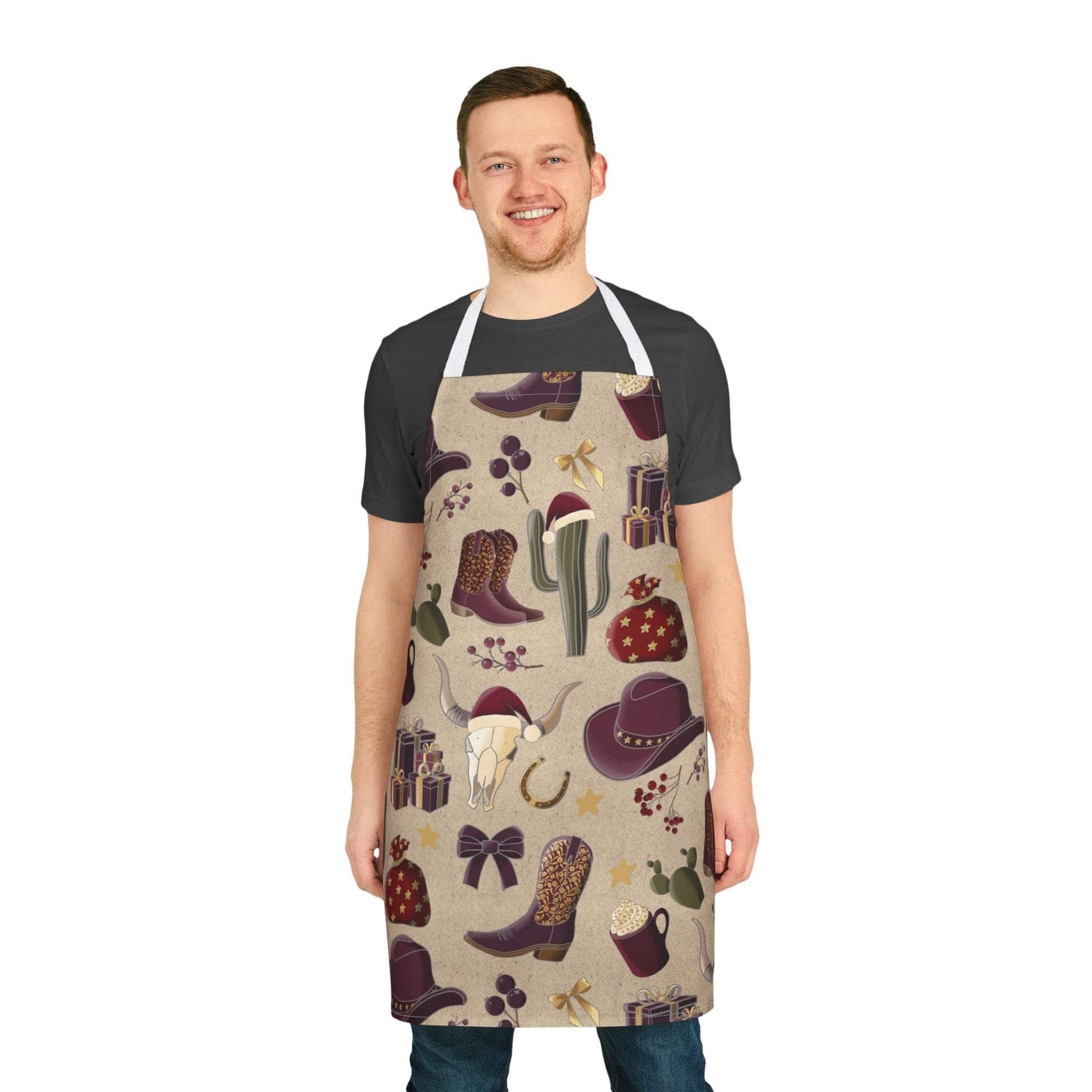 Man wearing a stain-free Cowboy Christmas apron with festive cowboy-themed designs including boots, hats, cactus, and holiday gifts