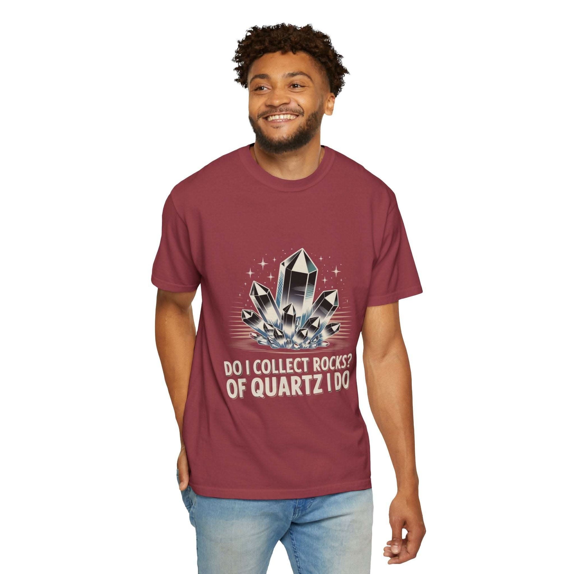 Man wearing a maroon t-shirt with a graphic design and text on a white background