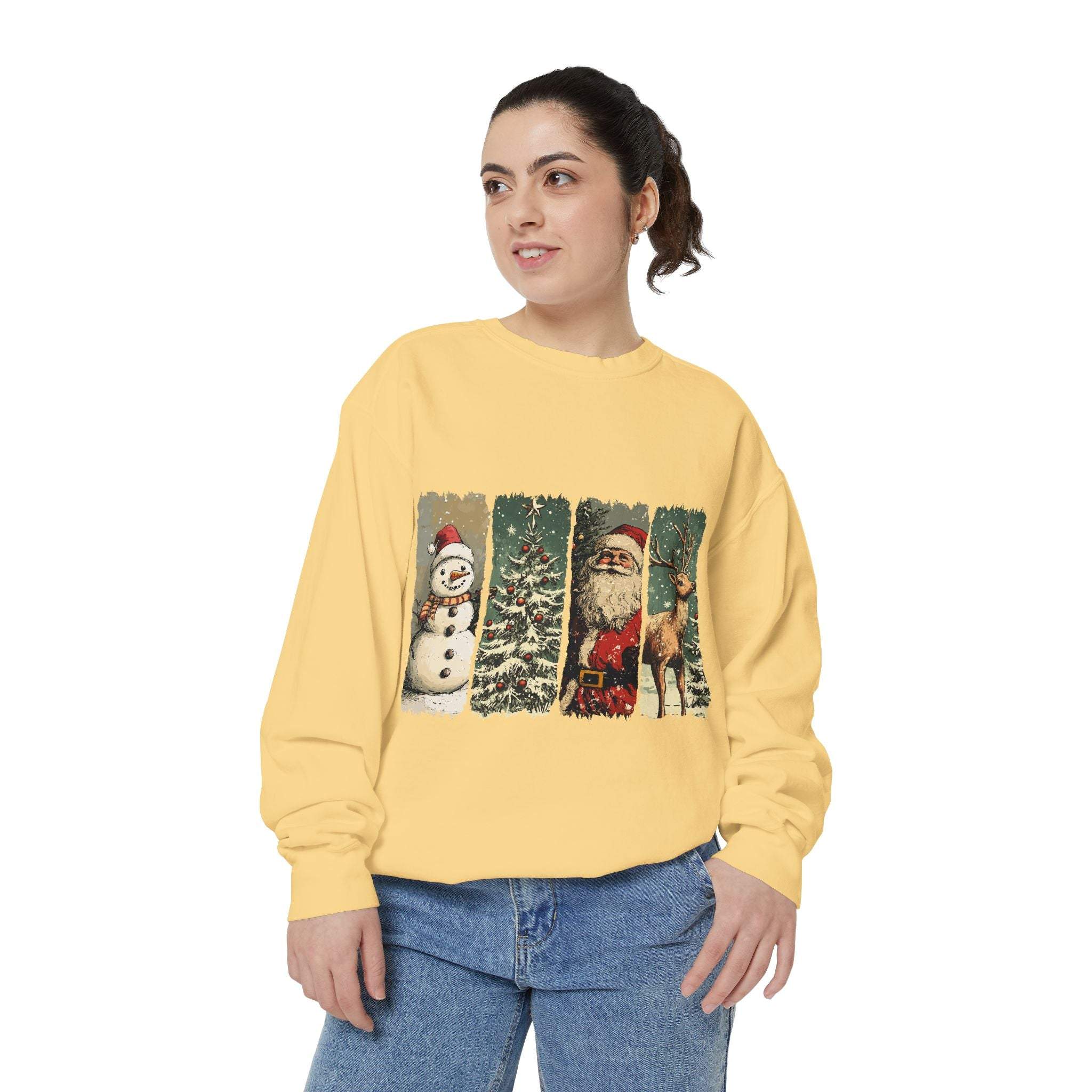 Vintage Christmas sweatshirt with watercolor holiday swatches featuring snowman, Christmas tree, Santa, and reindeer on soft yellow fabric